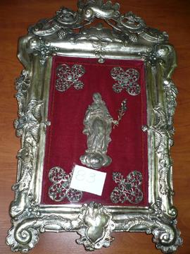 Wizerunek świętego Józefa za szkłem w srebrnej ramie